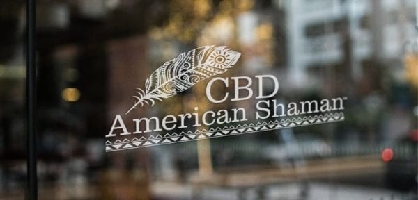 CBD American Shaman Logo On Glass